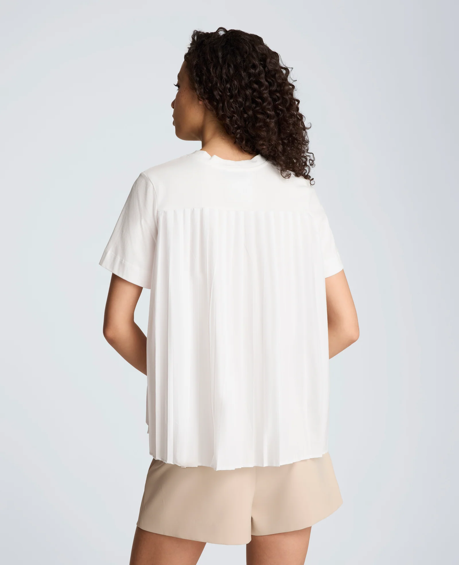 Short Sleeve Crewneck Tee with Pleated Asymmetrical Hem - Image 4