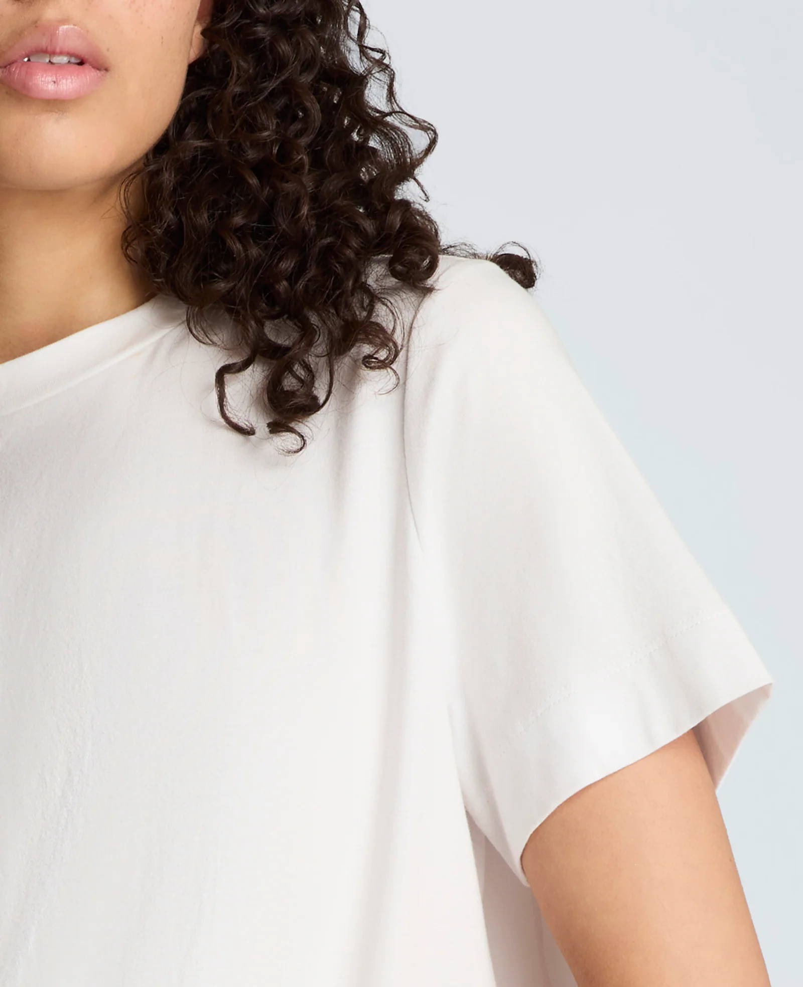 Short Sleeve Crewneck Tee with Pleated Asymmetrical Hem - Image 7